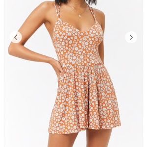 3/ $25 Strappy  Orange Daisy Romper Forever 21